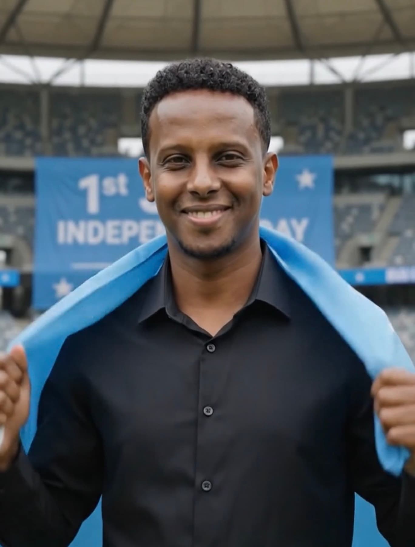 Deeq Afrika at a football stadium
